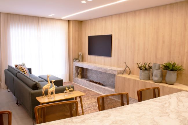 Aconchego em um espaço integrado: apartamento de 80m² oferece estilo contemporâneo para um casal clássico