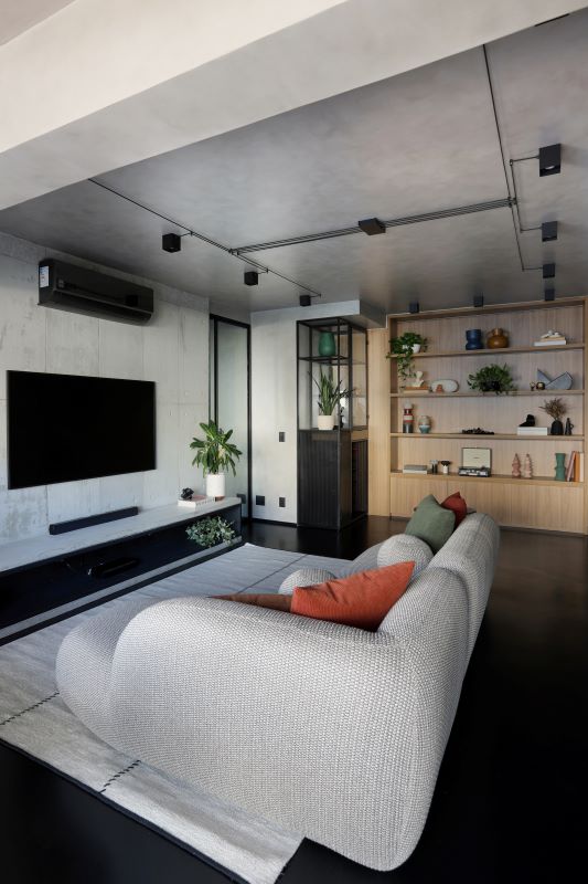 Serralheria e Concreto criam o estilo urbano deste apartamento